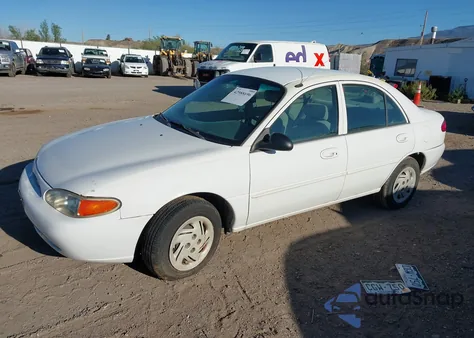 2000 Ford Escort из США, поврежденный, VIN 3FAFP13P3YR233571